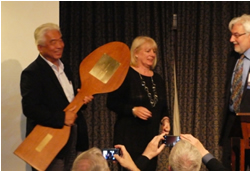 Koichi Yoshida received Interflam Trophy from Steve Grayson and Carole Franks